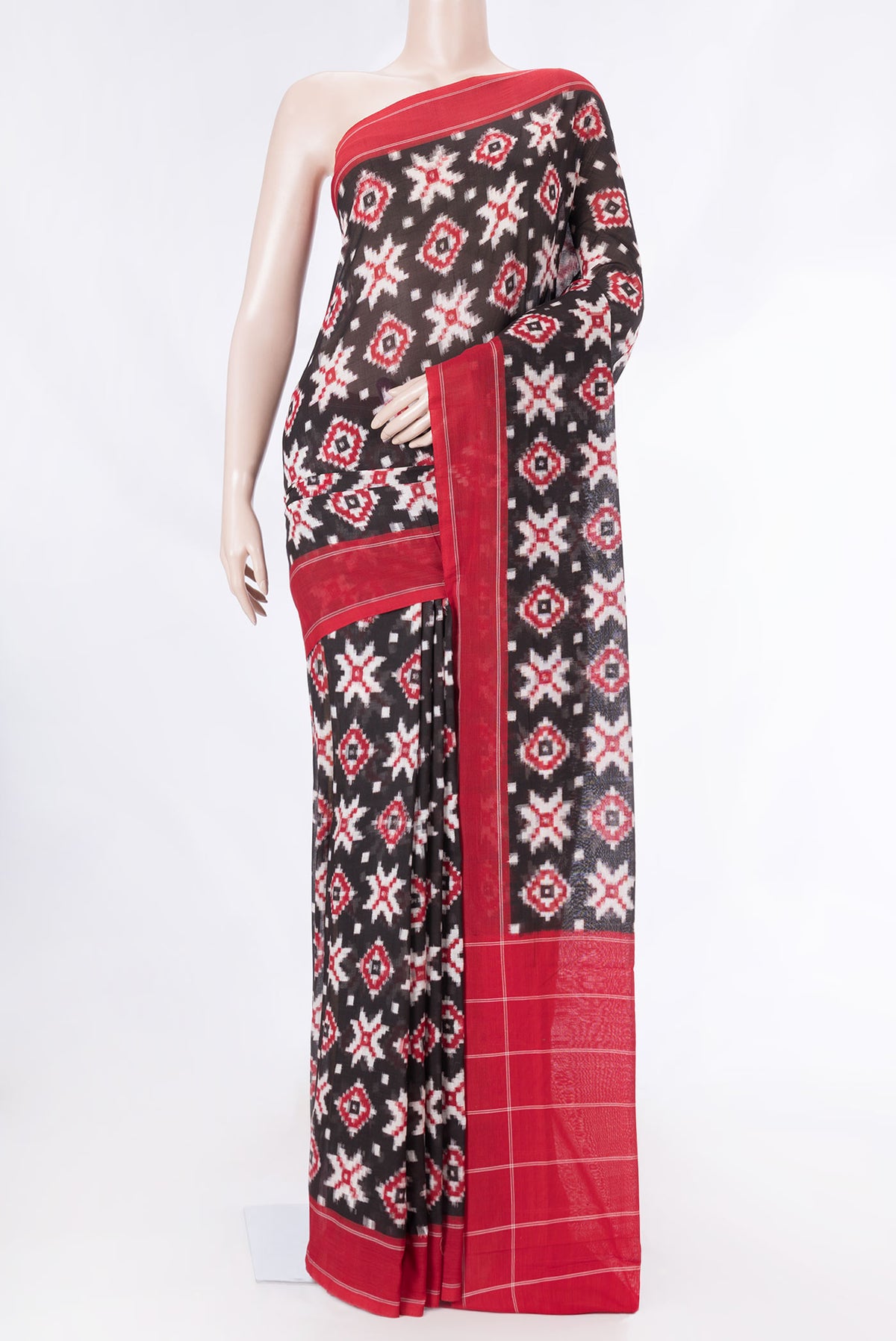 Black Dual Tone Double Ikat Saree with Ikat Print on the body and Plain Border displayed on a mannequin