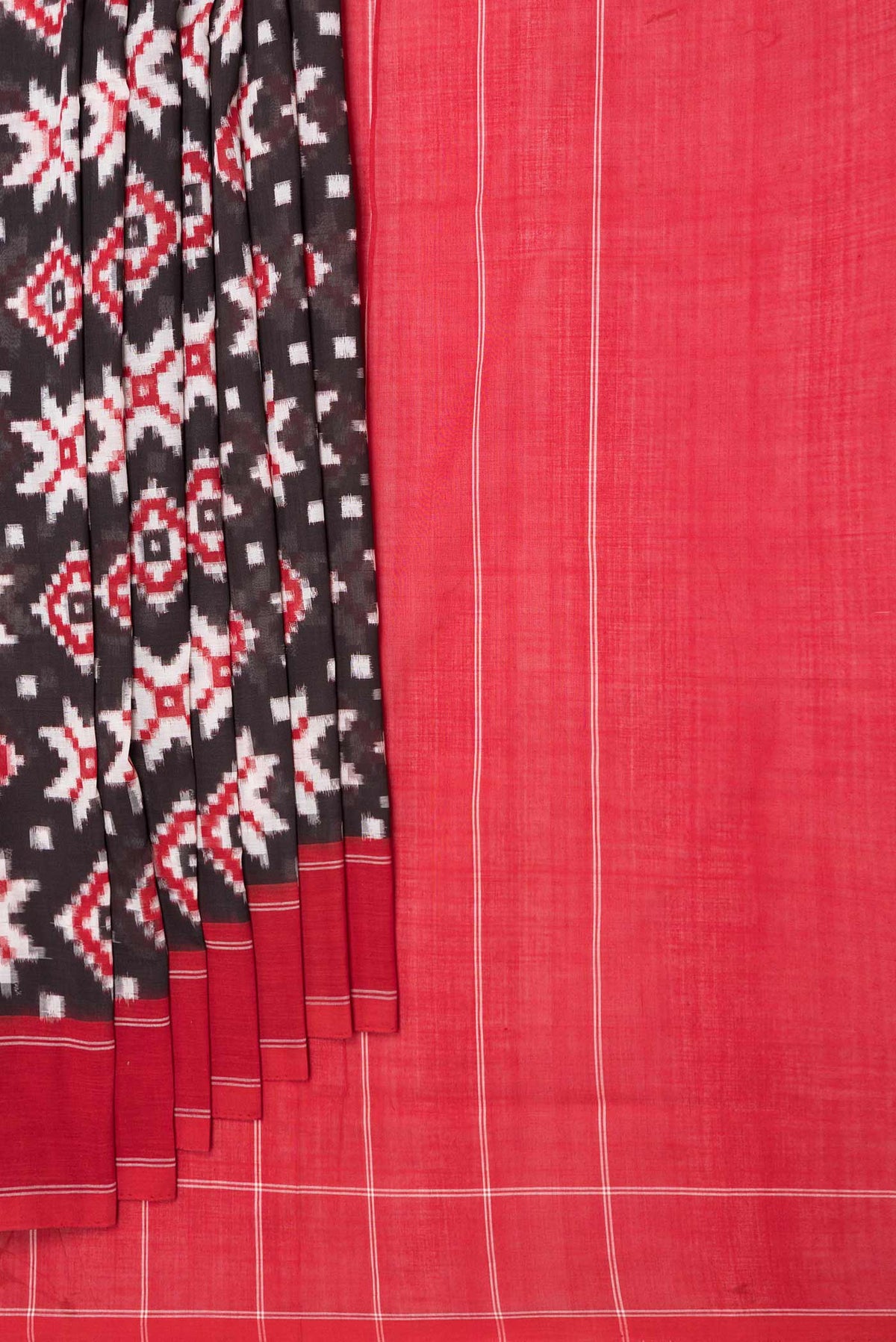 Pleats and pallu of Black Dual Tone Double Ikat Saree with Ikat Print on the body and Plain Border
