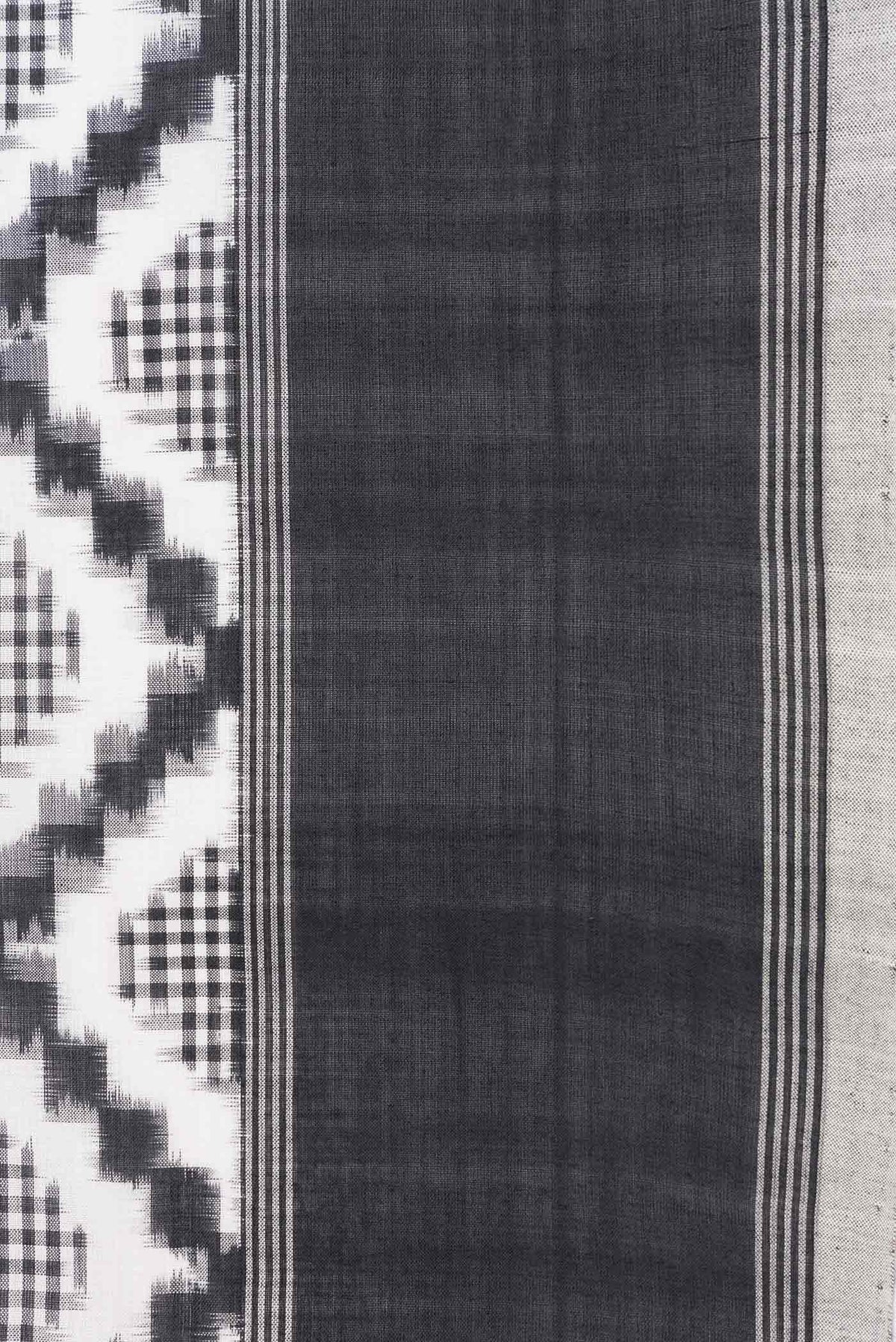 Border image of Off White Dual Tone Double Ikat Saree with Ikat Print on the body and Plain Border