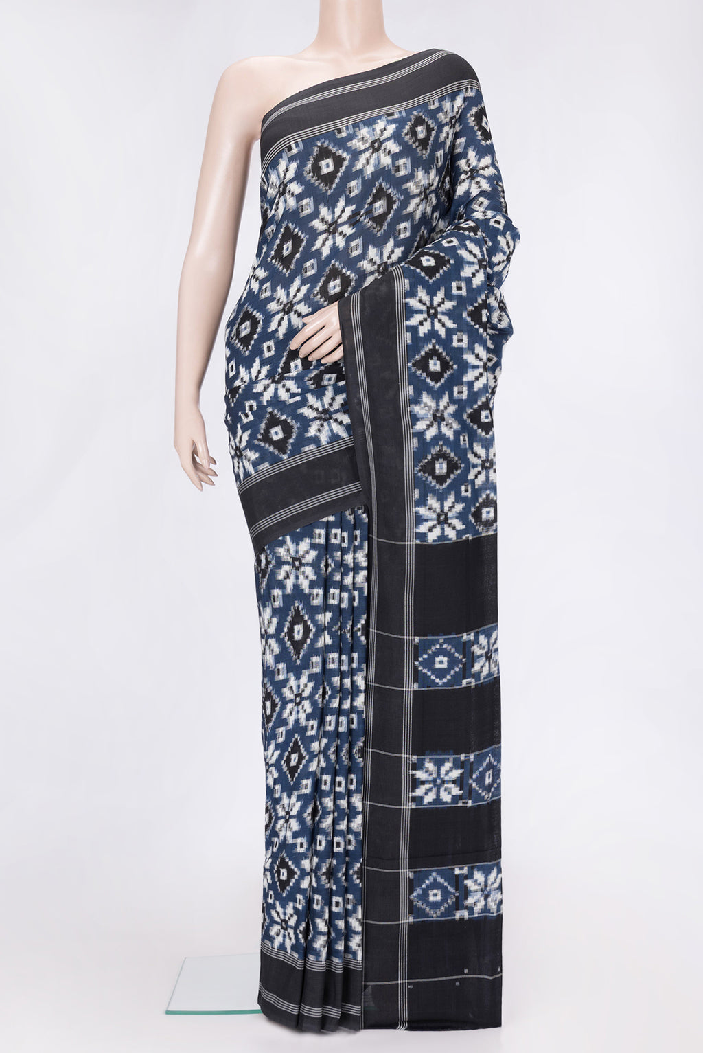 Blue Dual Tone Double Ikat Saree with Ikat Print on the body and Thread Border.  displayed on a mannequin