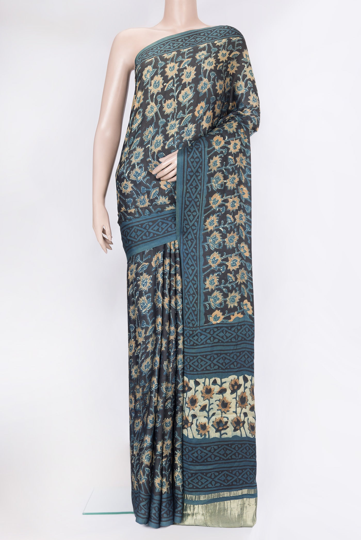 Black Blended Satin Crepe Saree with Printed design on the body and Printed Border.  displayed on a mannequin