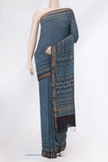 Blue Grey Dual Tone Tussar Silk Saree with Printed design on the body and Zari Border.  displayed on a mannequin