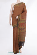 Pure Silk Maroon Dual Tone Tussar Saree with Printed design on the body and Zari Border.  displayed on a mannequin