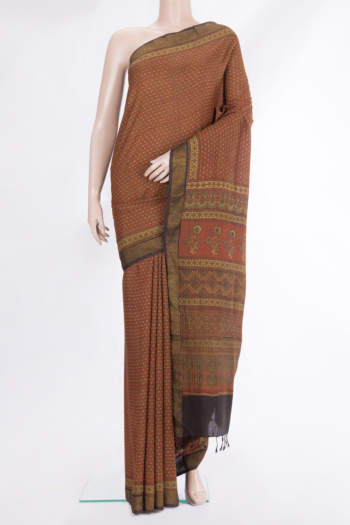 Pure Silk Maroon Dual Tone Tussar Saree with Printed design on the body and Zari Border.  displayed on a mannequin