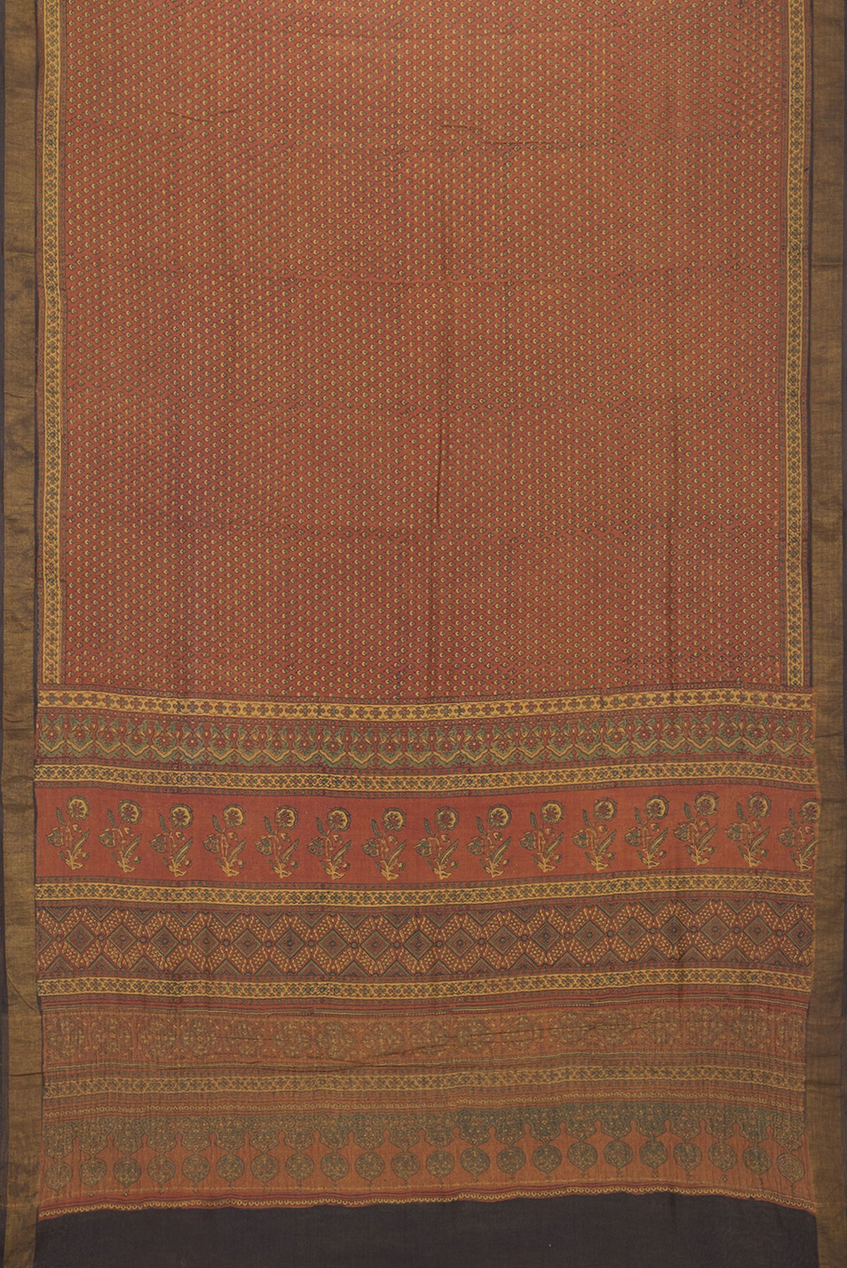 Flat view of Pure Silk Maroon Dual Tone Tussar Saree with Printed design on the body and Zari Border. 