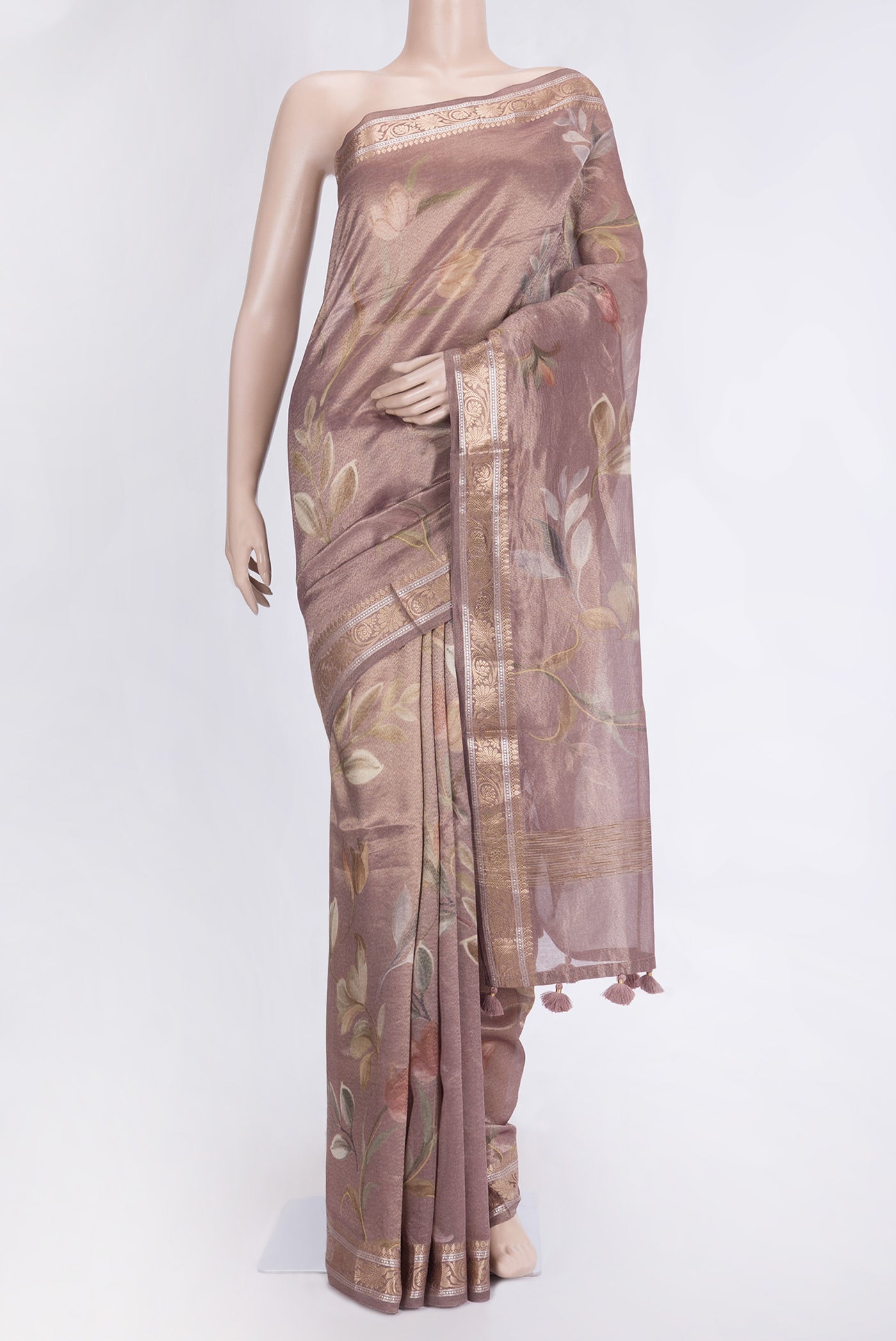 Rose Gold Dual Tone Organza Silk Saree with Printed design on the body and Zari Border.  displayed on a mannequin