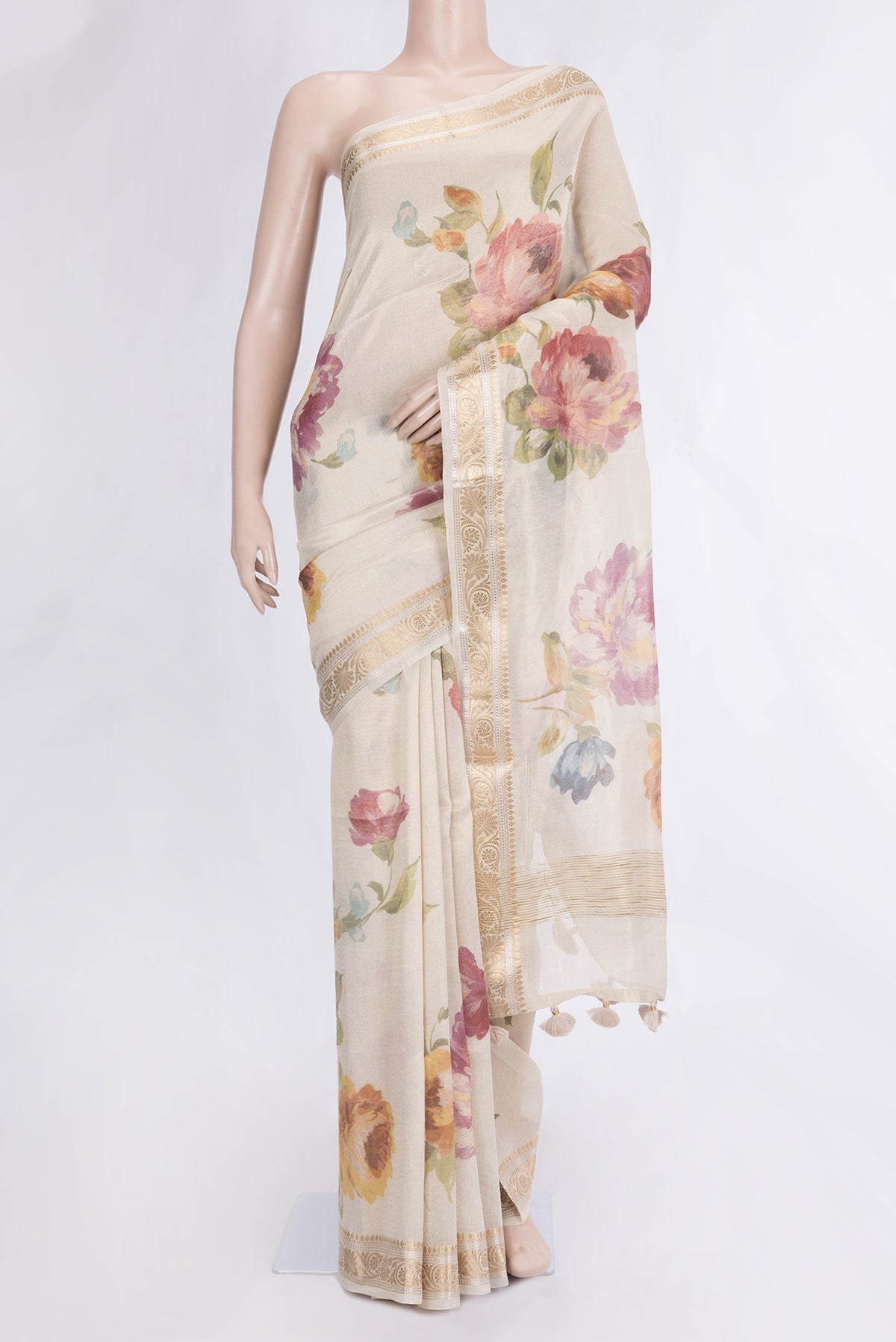 Beige Dual Tone Organza Silk Saree with Printed design on the body and Zari Border.  displayed on a mannequin