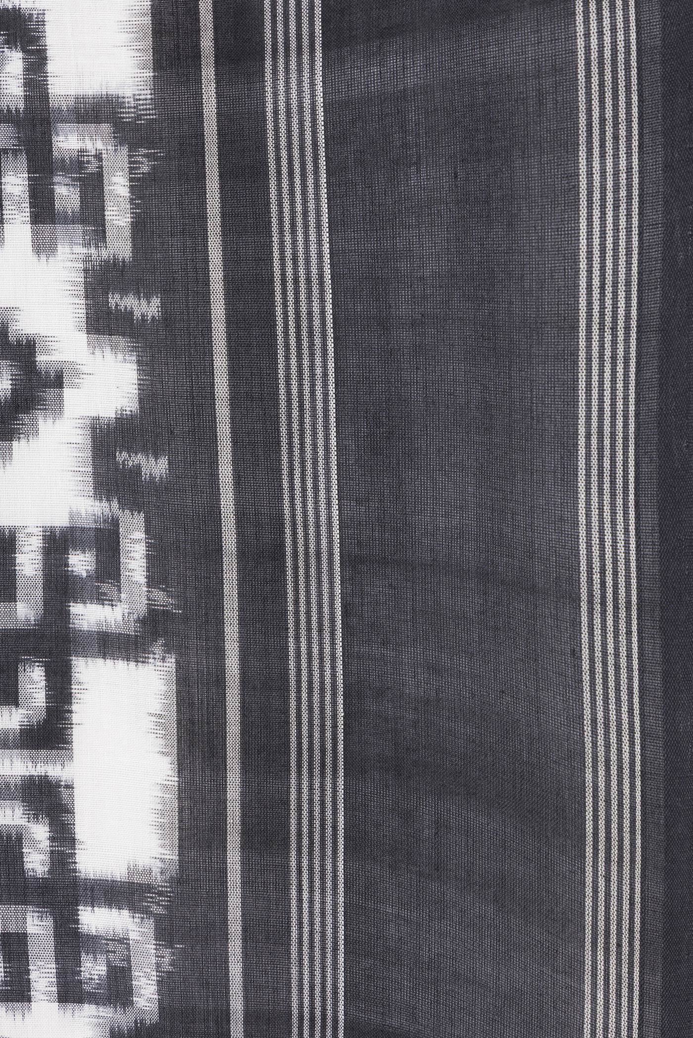 Border image of Black and White Color Double Ikat Saree with Ikat Print on the body and Thread Border. 