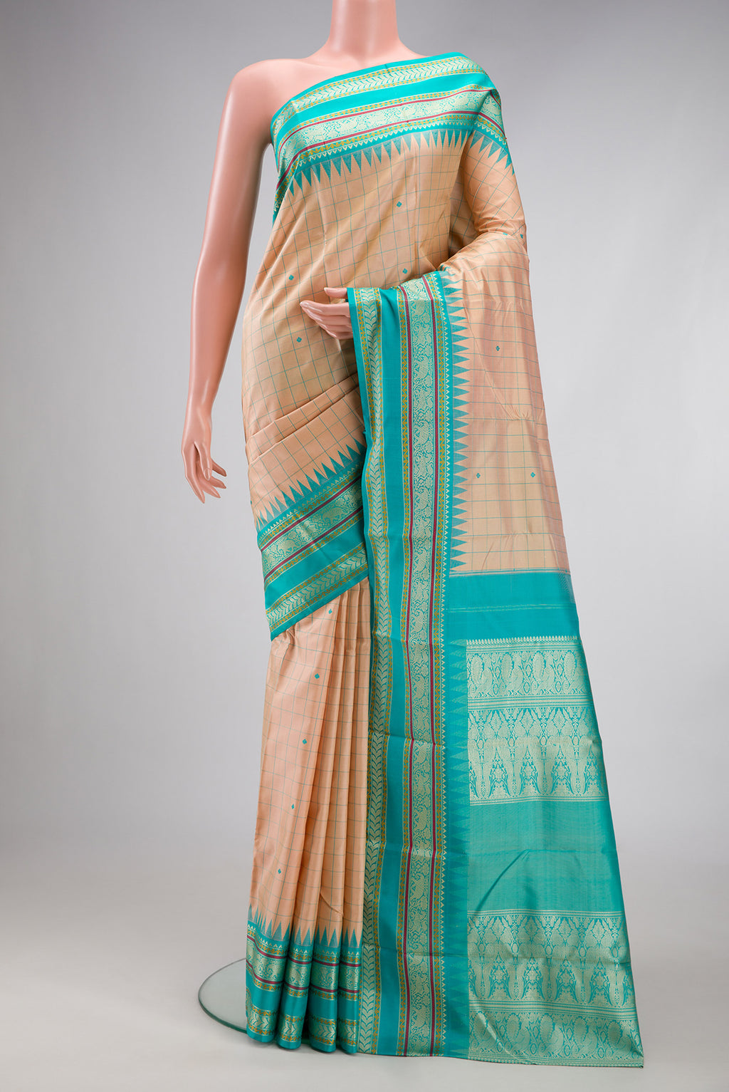 Sandal Kanjivaram Silk Saree with Checked design on the body and Thread Border.  displayed on a mannequin