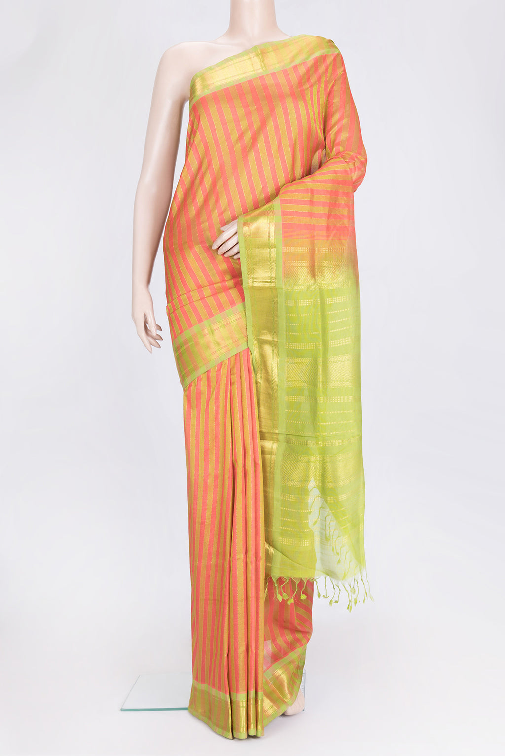 Green and Pink Color Silk Cotton Saree with Stripes on the body and Zari Border.  displayed on a mannequin