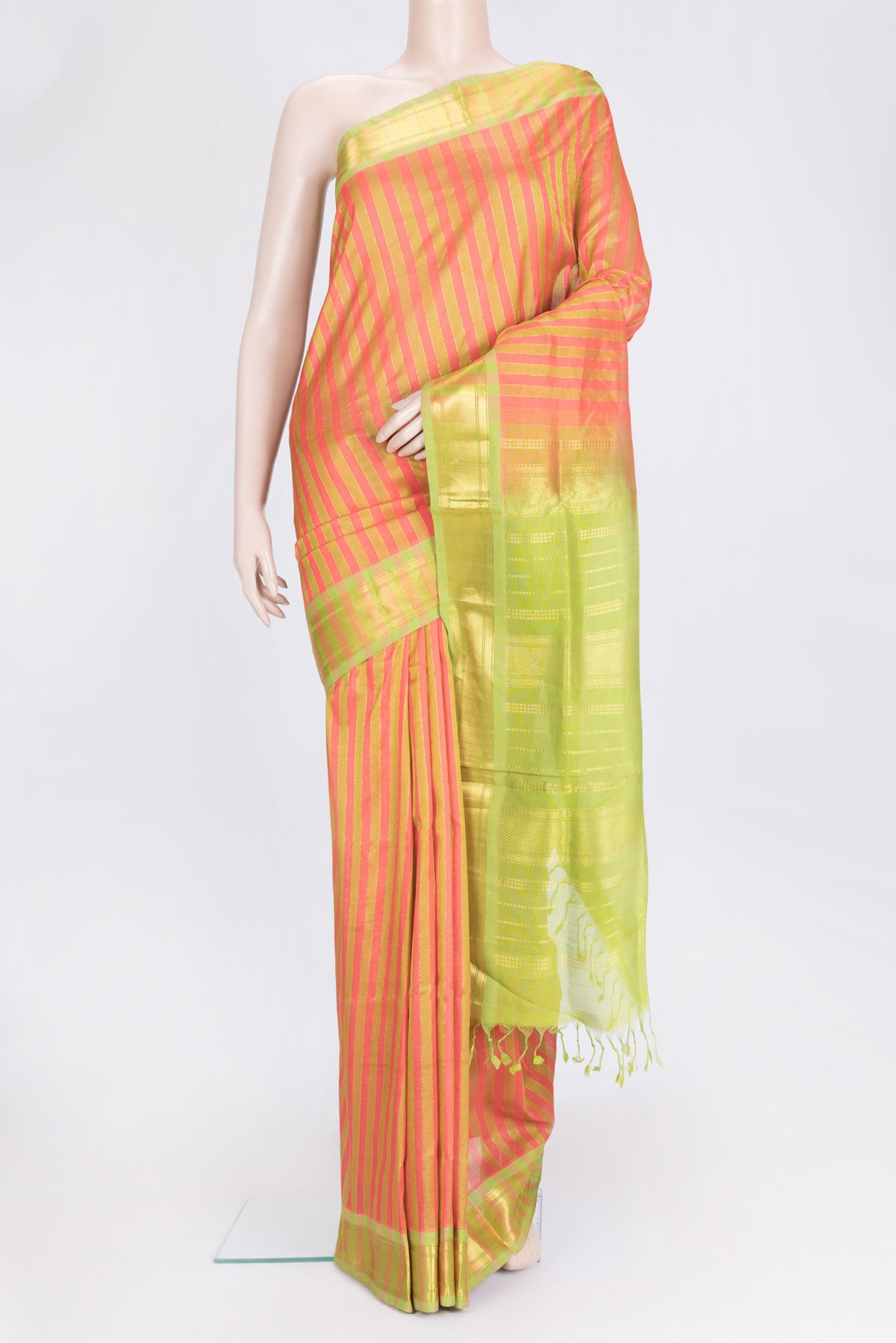 Green and Pink Color Silk Cotton Saree with Stripes on the body and Zari Border.  displayed on a mannequin
