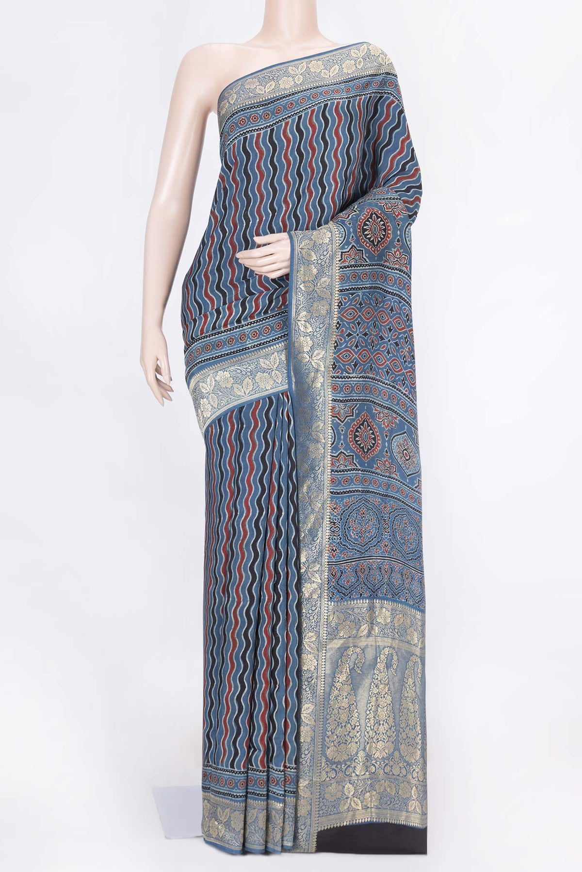Blue Dual Tone Tussar Silk Saree with Printed design on the body and Zari Border displayed on a mannequin