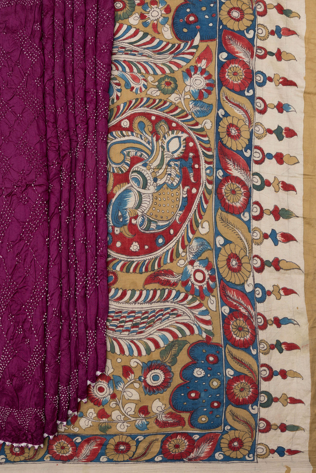 Pleats and pallu of Pure Silk Magenta Bandhani Saree with Bandhani Print on the body and Without Border. 
