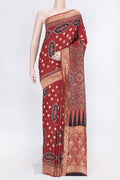 Maroon Dual Tone Tussar Silk Saree with Printed design on the body and Zari Border displayed on a mannequin