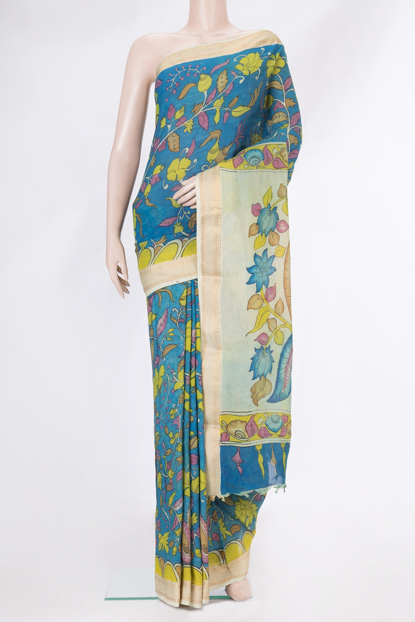Sky Blue Dual Tone Tussar Silk Saree with kalamkari Print on the body and Zari Border.  displayed on a mannequin