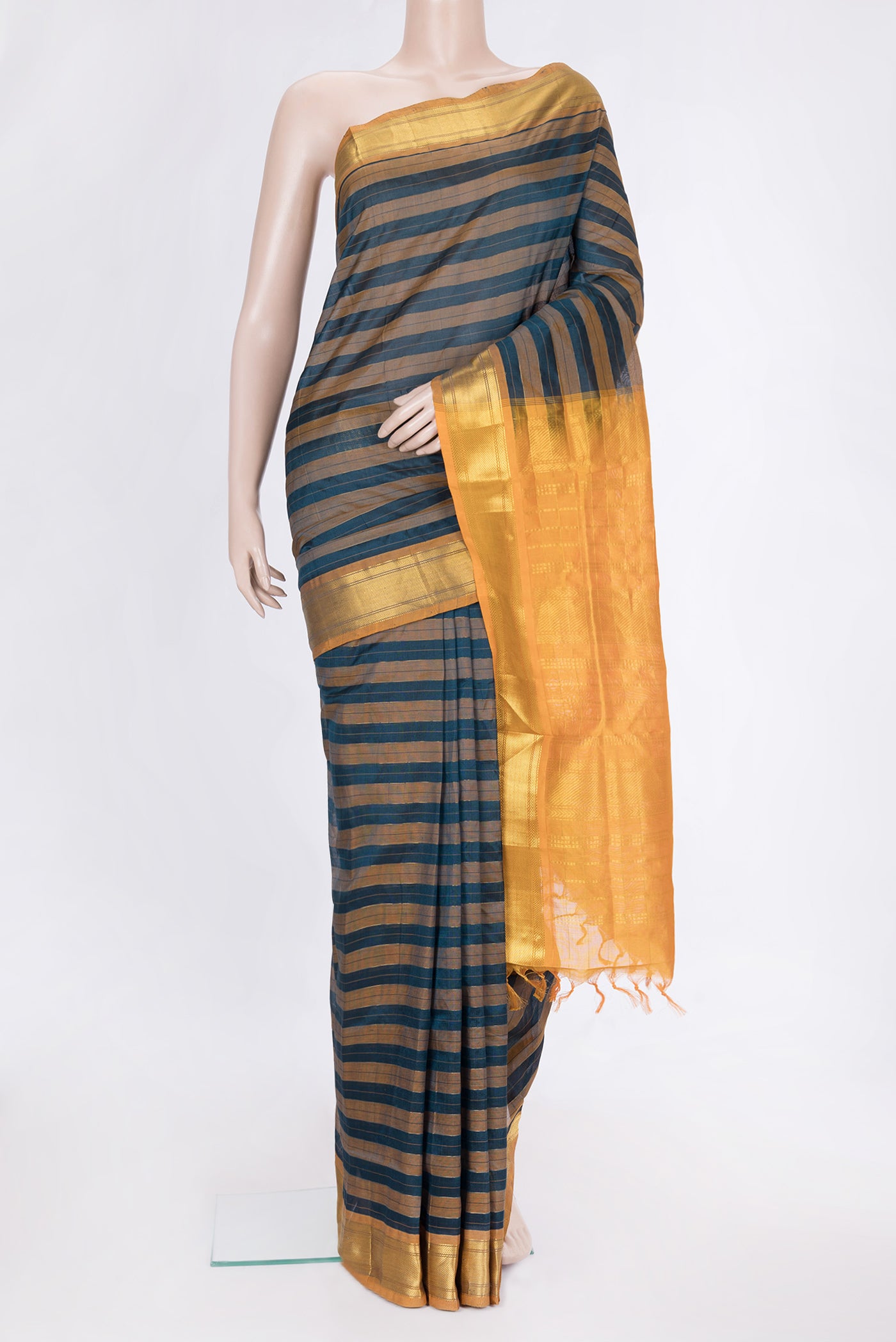 Peacock Blue Dual Tone Silk Cotton Saree with Stripes on the body and Zari Border.  displayed on a mannequin
