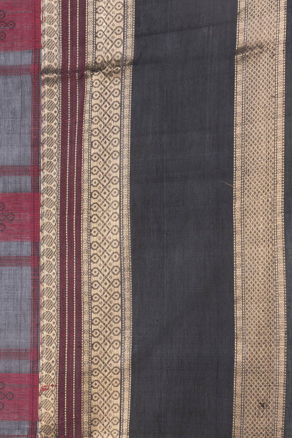 Border image of Black Dual Tone Silk Cotton Saree with Thread Butta on the body and Zari Border. 