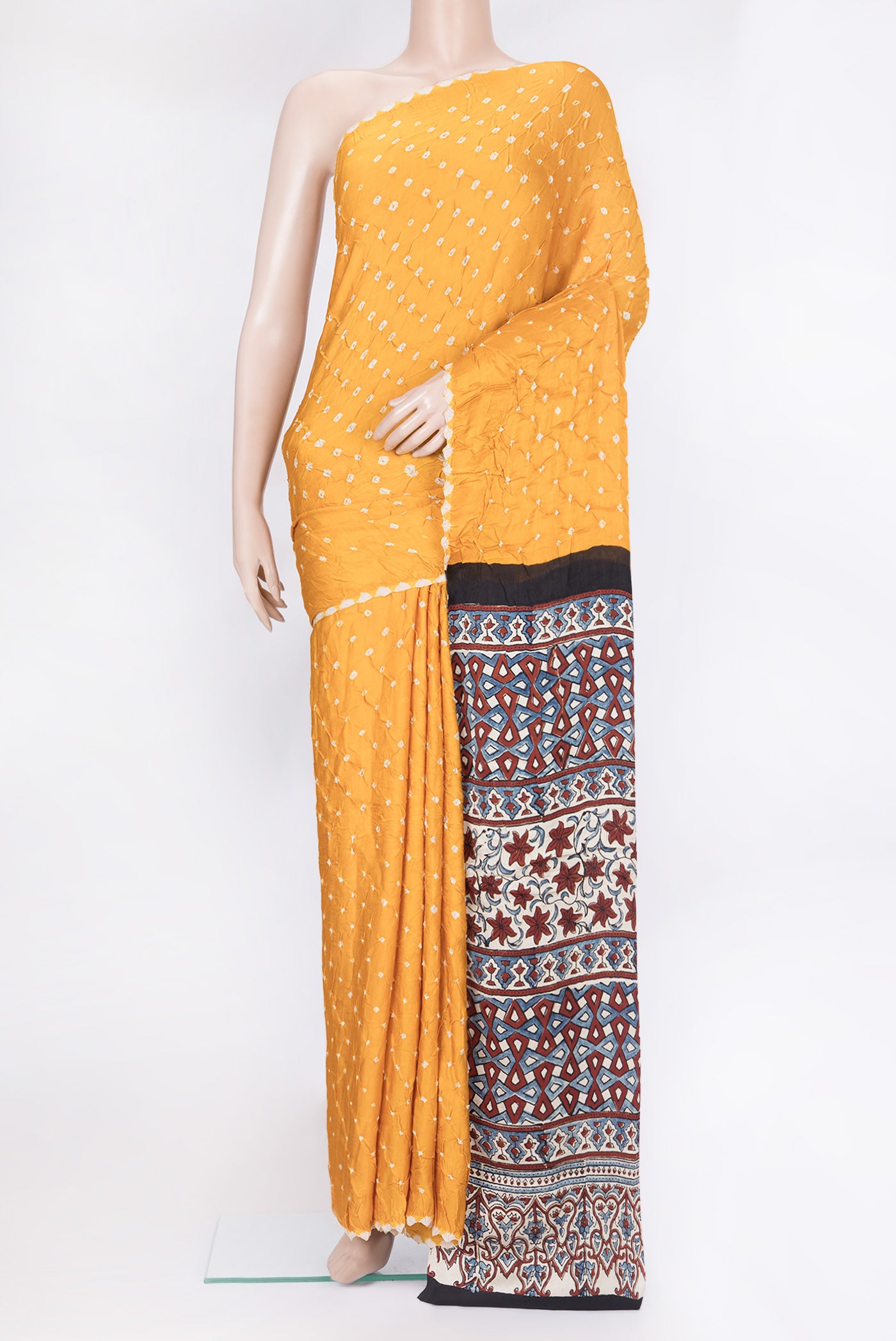 Yellow Blended Satin Crepe Saree with Bandhani Print on the body and Without Border.  displayed on a mannequin