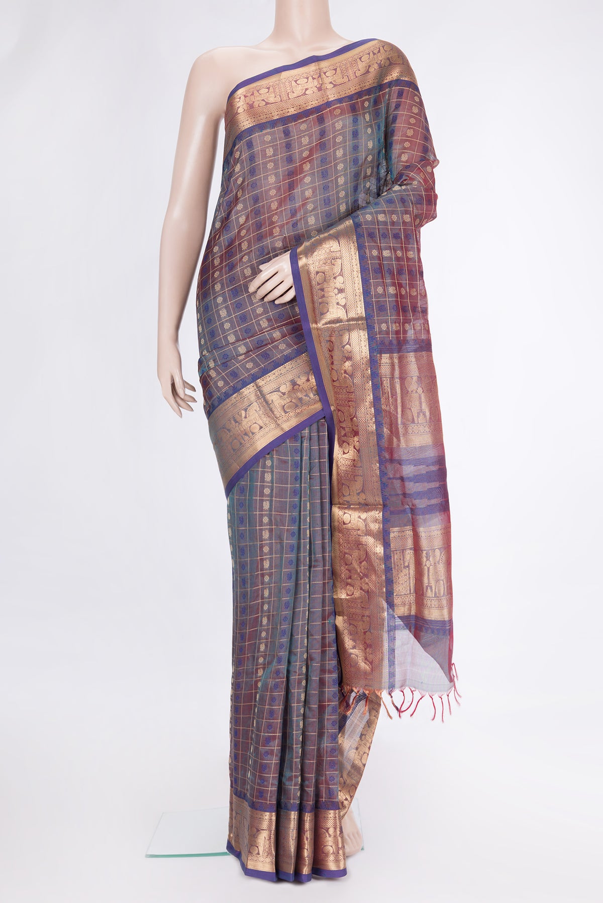 Peacock Blue Dual Tone Silk Cotton Saree with Thread Butta on the body and Zari Border.  displayed on a mannequin