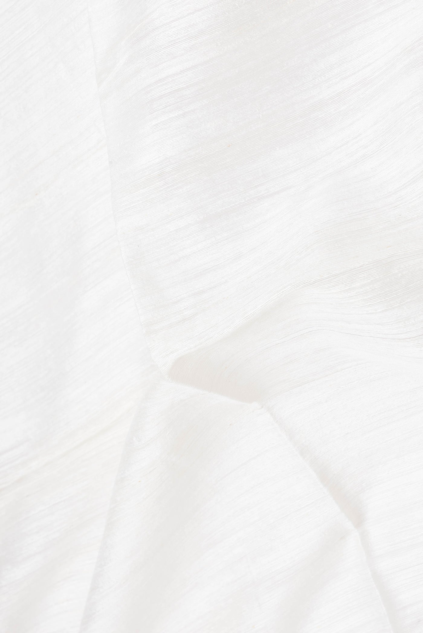 Close up of Off White Dual Tone Linen Saree with Plain Body and Fancy Border.  displaying folds