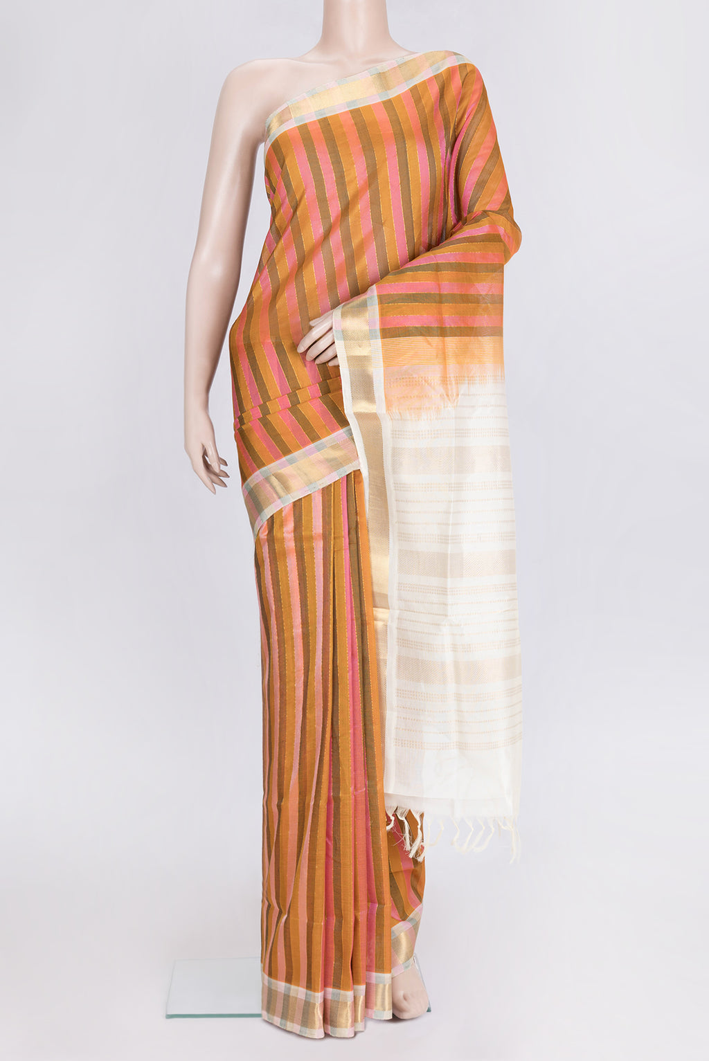 Pink and Mustard Color Silk Cotton Saree with Stripes on the body and Zari Border.  displayed on a mannequin