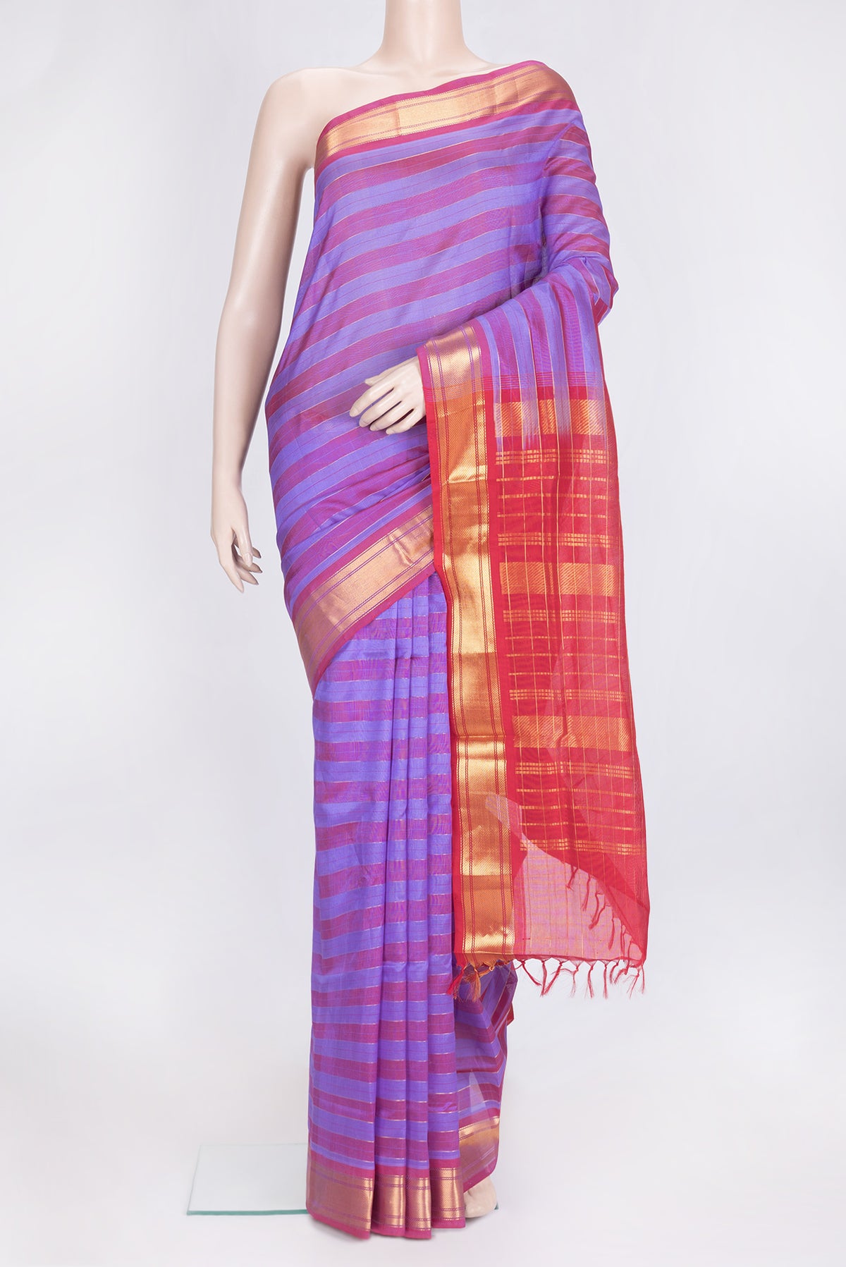 Lavender and Maroon Color Silk Cotton Saree with Stripes on the body and Zari Border.  displayed on a mannequin