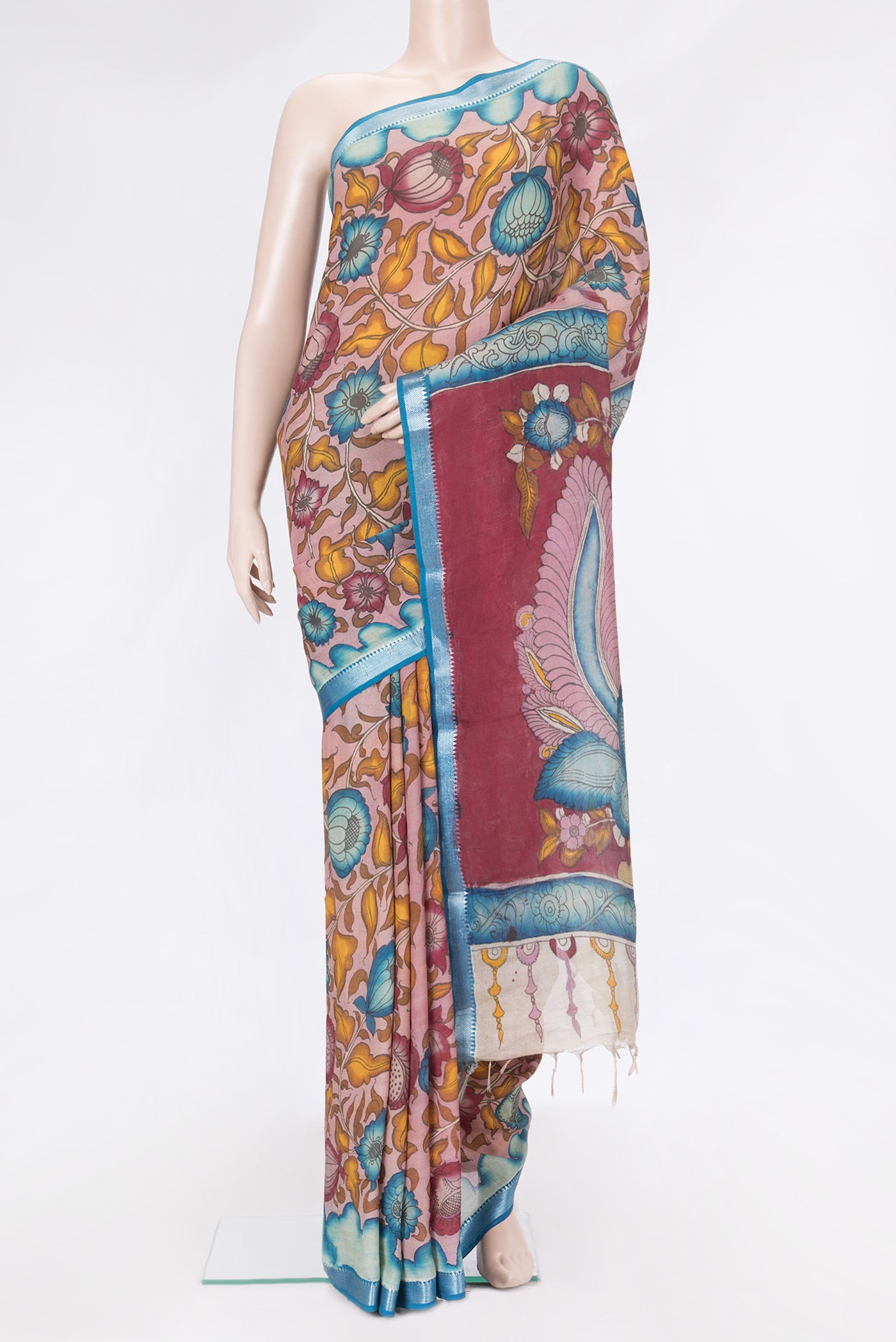Pink Dual Tone Tussar Silk Saree with kalamkari Print on the body and Zari Border.  displayed on a mannequin