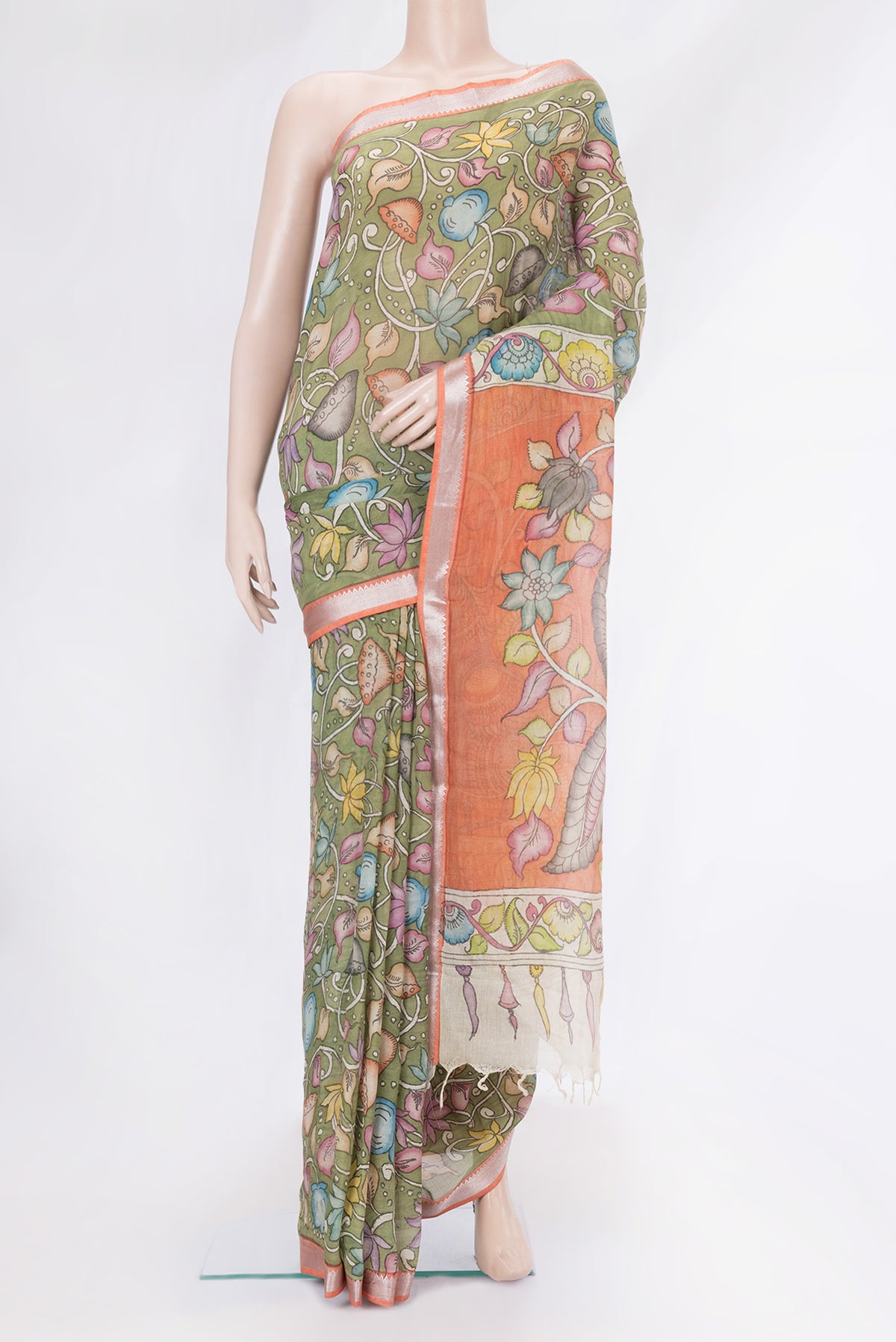 Olive Green Dual Tone Tussar Silk Saree with kalamkari Print on the body and Zari Border.  displayed on a mannequin