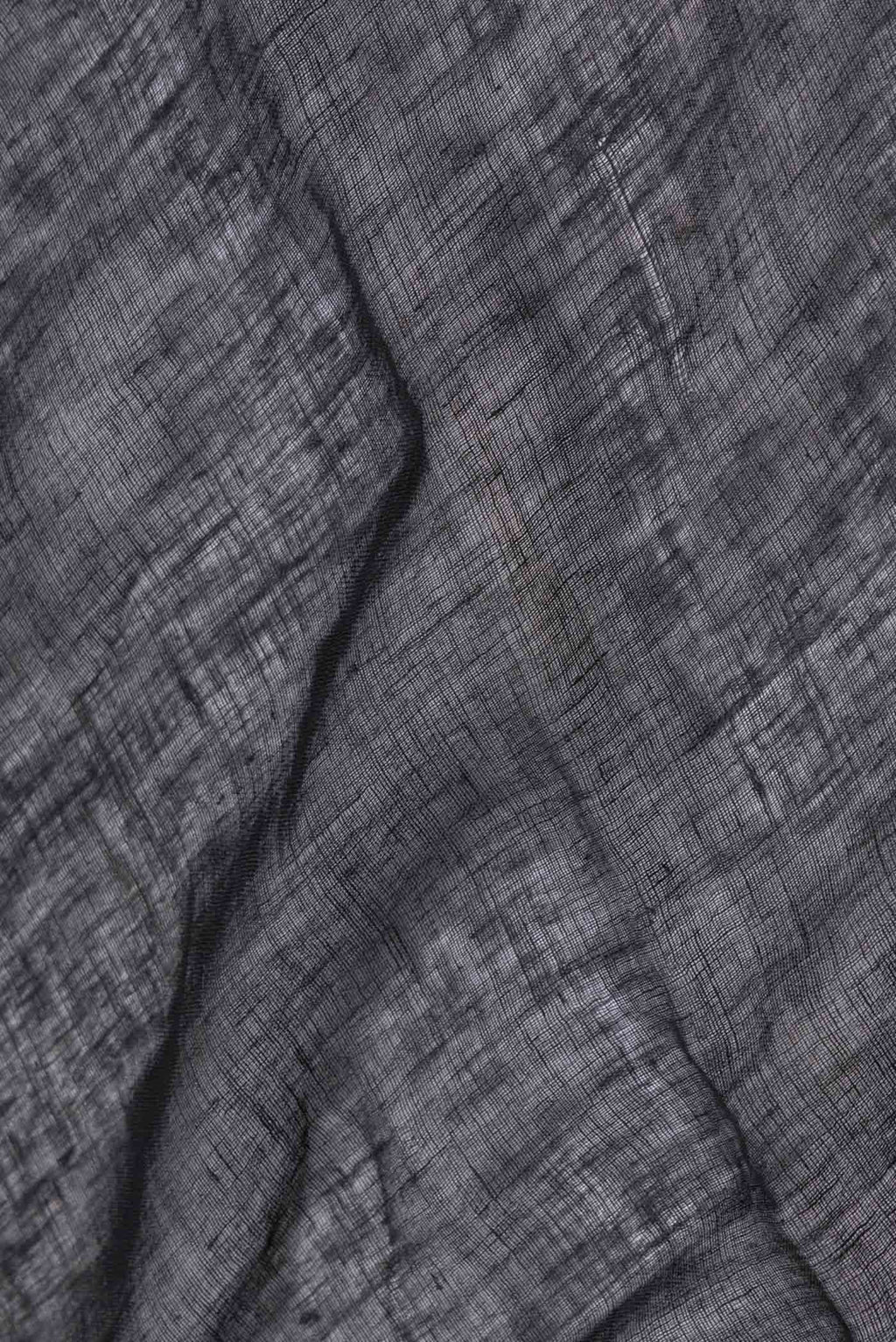 Close up of Black Dual Tone Linen Saree with Embroidery on the body and Embroidery Border.  displaying folds