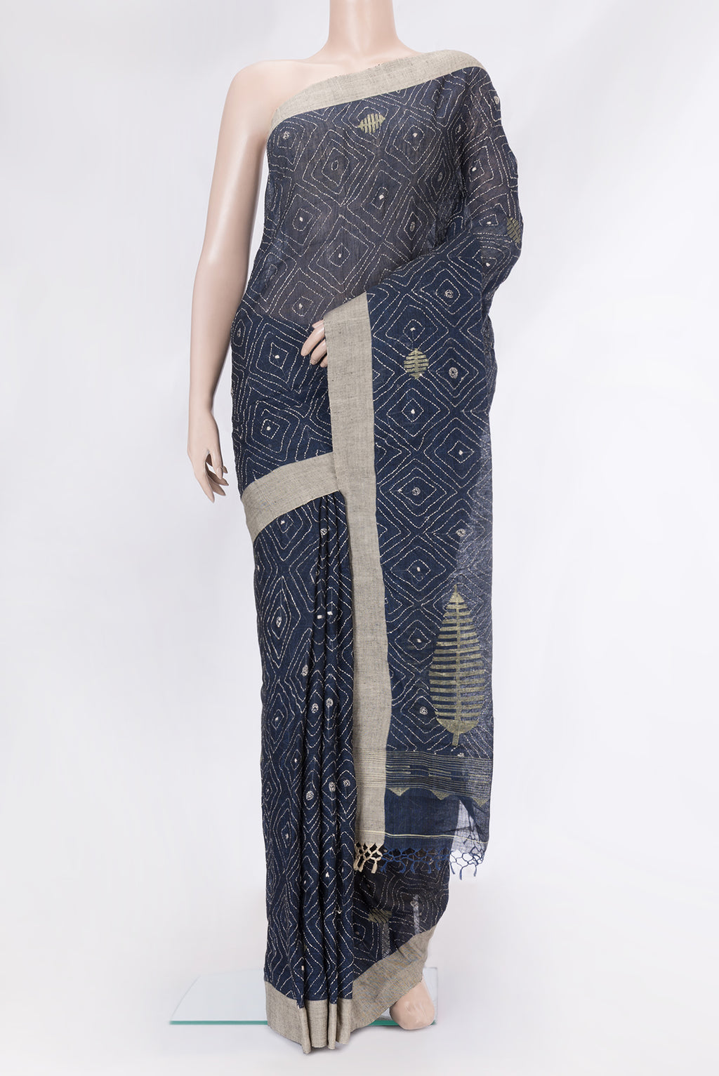 Navy Blue Dual Tone Tussar Silk Saree with Embroidery on the body and Plain Border.  displayed on a mannequin
