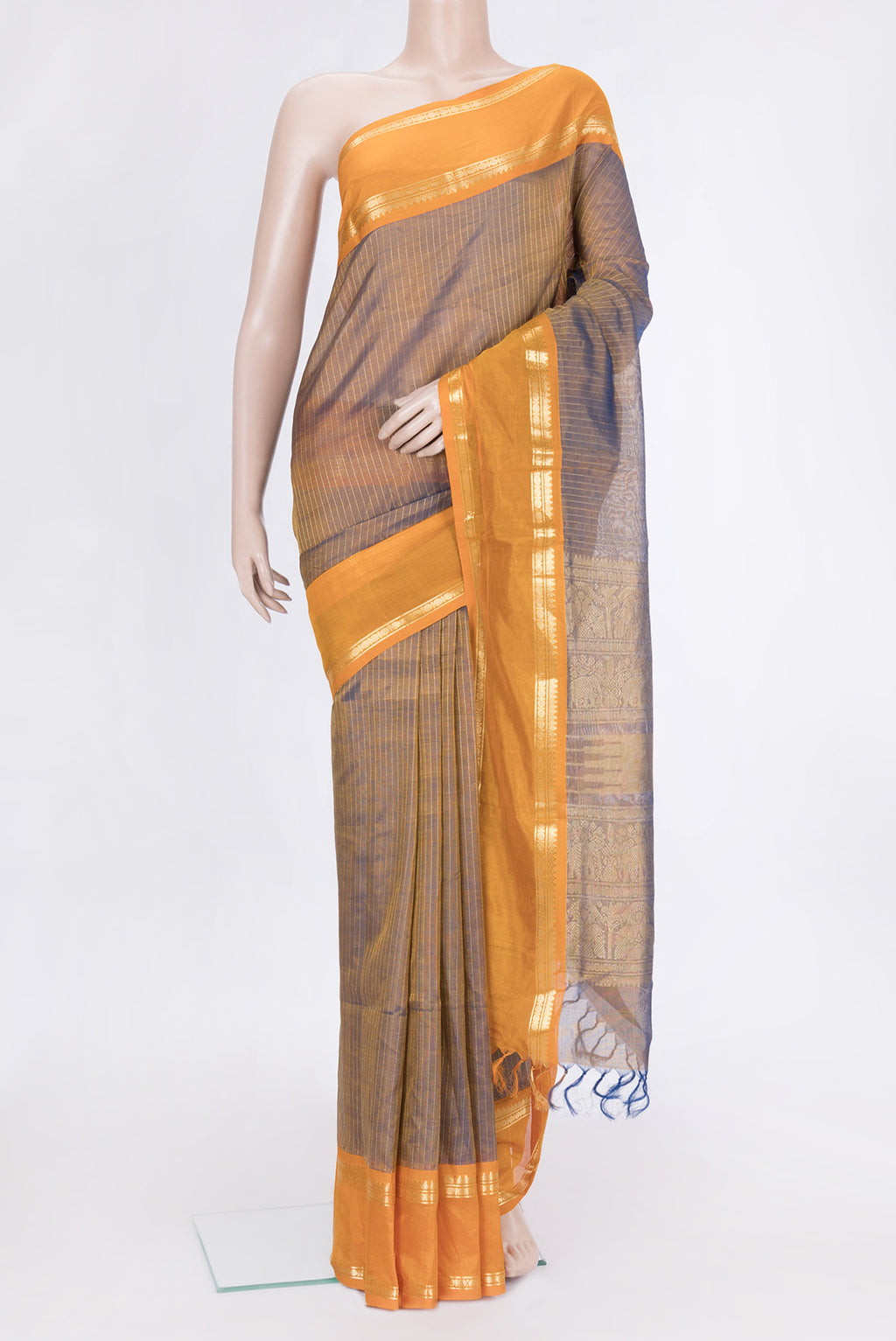 Brown Dual Tone Silk Cotton Saree with Stripes on the body and Zari Border.  displayed on a mannequin