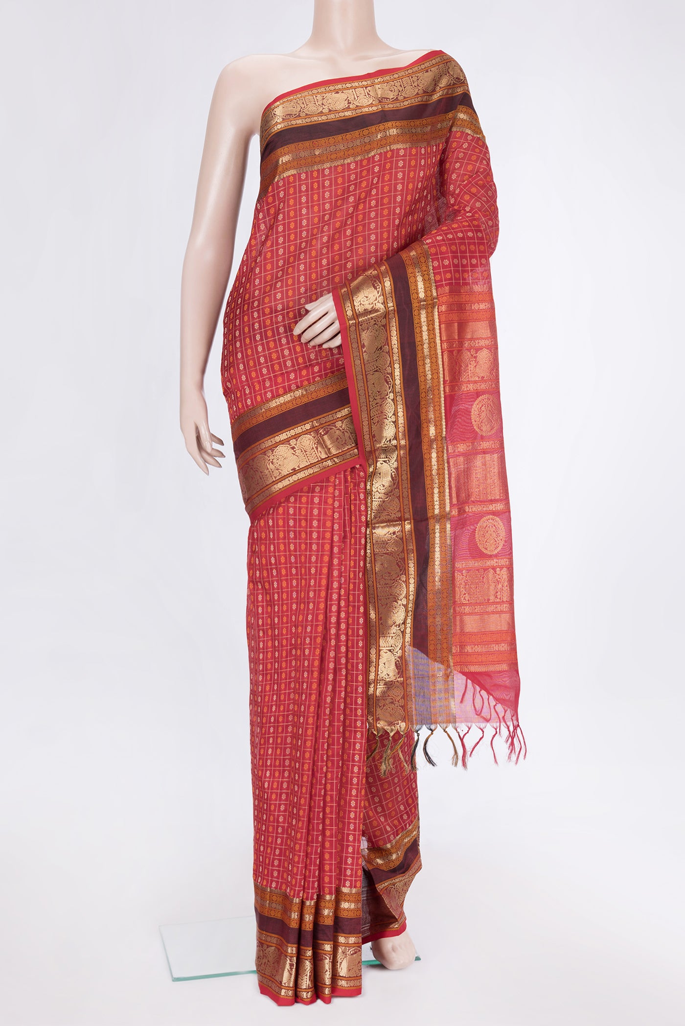 Red Dual Tone Silk Cotton Saree with Thread Butta on the body and Zari Border.  displayed on a mannequin