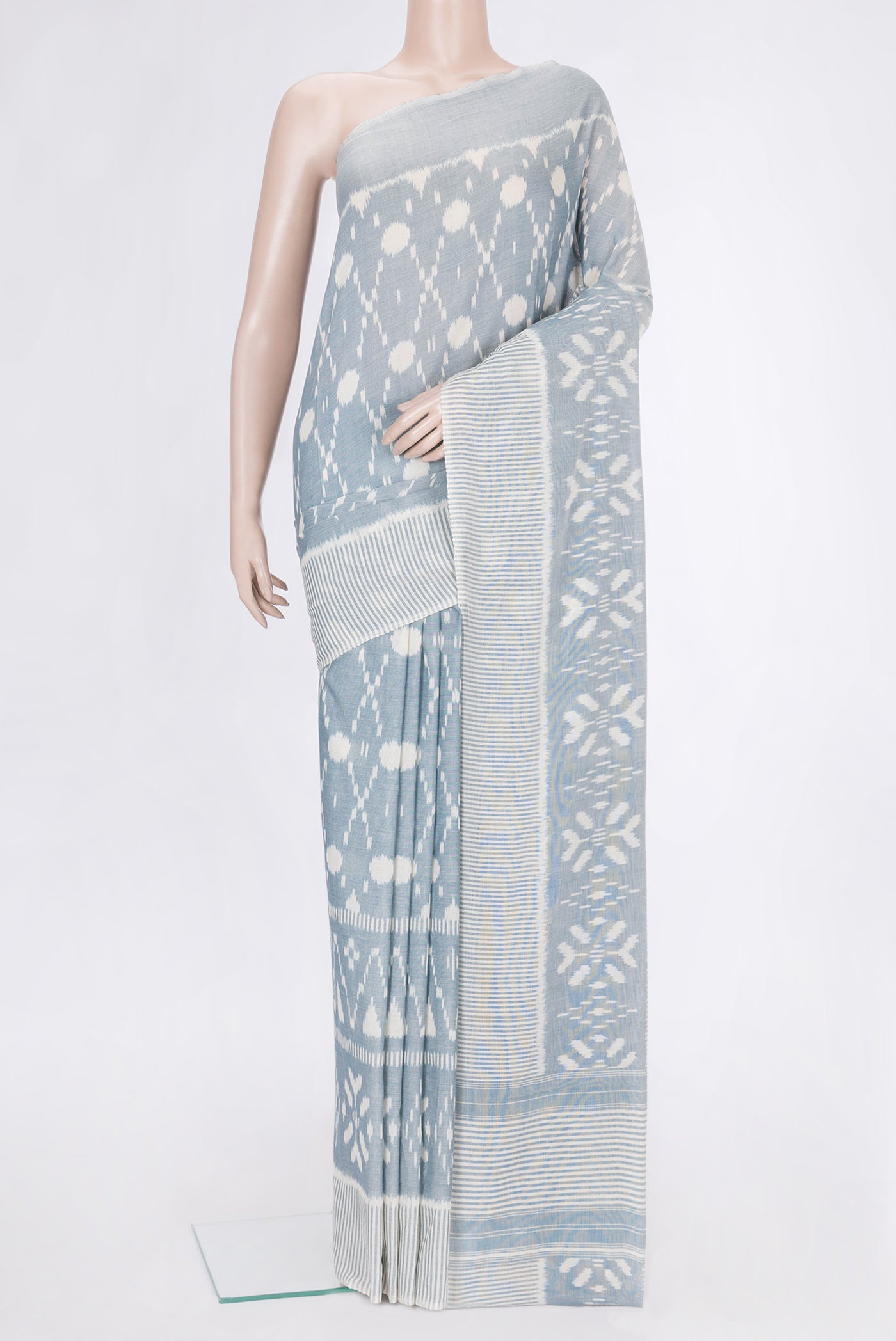 Grey Dual Tone Cotton Saree with Ikat Print on the body and Plain Border.  displayed on a mannequin