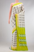Off White Dual Tone Double Ikat Saree with Ikat Print on the body and Plain Border.  displayed on a mannequin