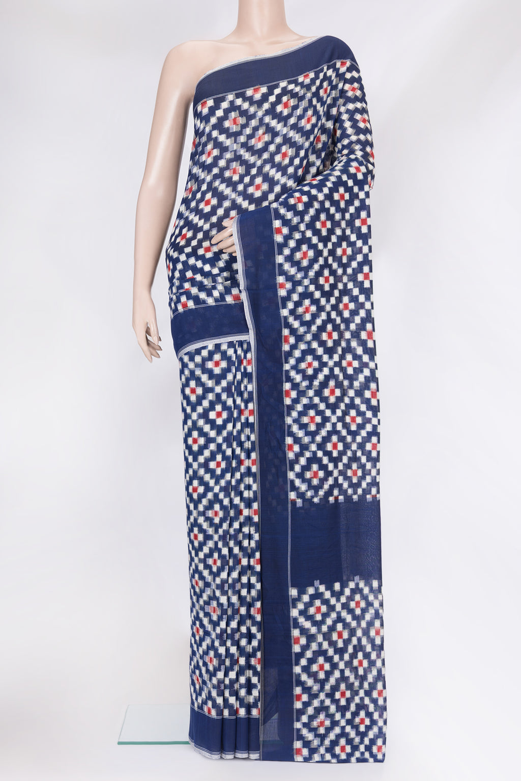 Dark Blue Pochampally Cotton Saree with Ikat design on the body and Plain Border.  displayed on a mannequin
