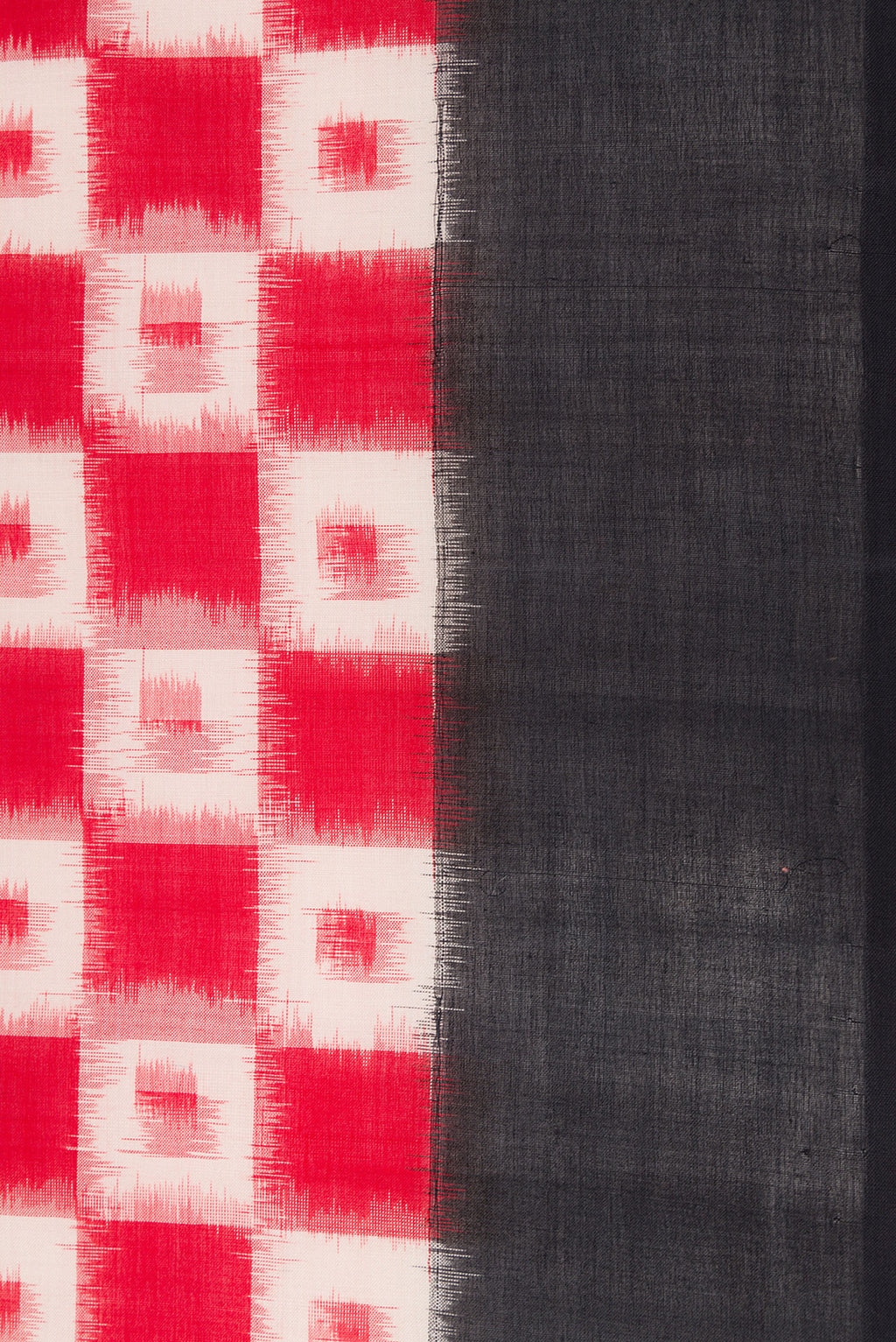 Border image of Red Dual Tone Double Ikat Saree with Ikat Print on the body and Plain Border. 