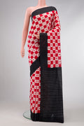 Red Dual Tone Double Ikat Saree with Ikat Print on the body and Plain Border.  displayed on a mannequin