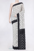 Off White Dual Tone Double Ikat Saree with Ikat Print on the body and Thread Border.  displayed on a mannequin