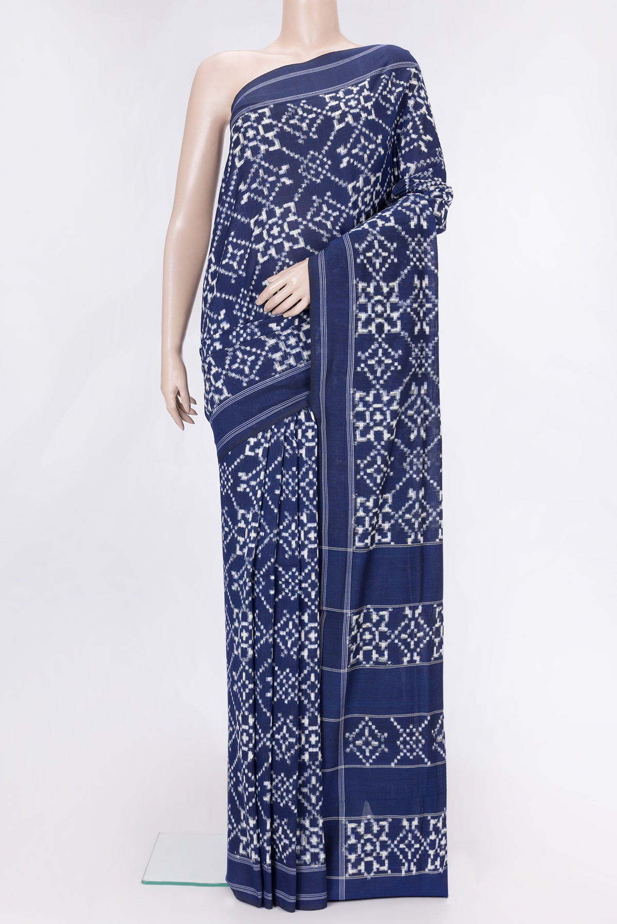 Navy Blue Dual Tone Double Ikat Saree with Ikat Print on the body and Thread Border.  displayed on a mannequin