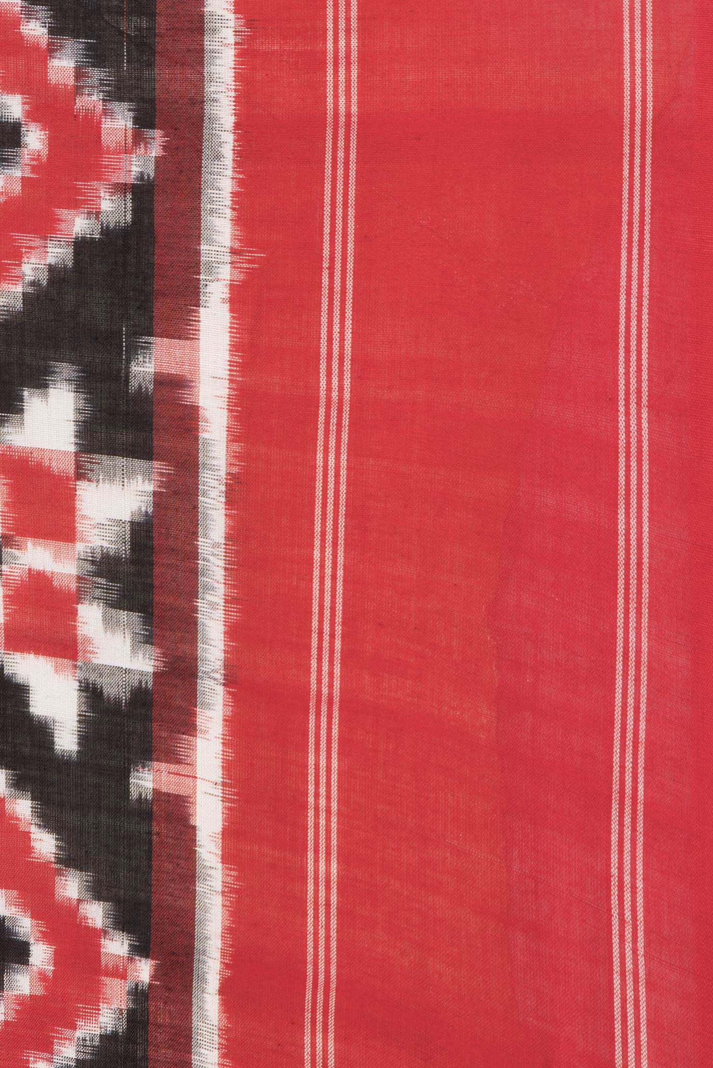 Border image of Black Dual Tone Double Ikat Saree with Ikat Print on the body and Thread Border. 