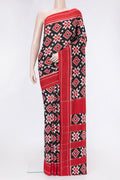 Black Dual Tone Double Ikat Saree with Ikat Print on the body and Thread Border.  displayed on a mannequin