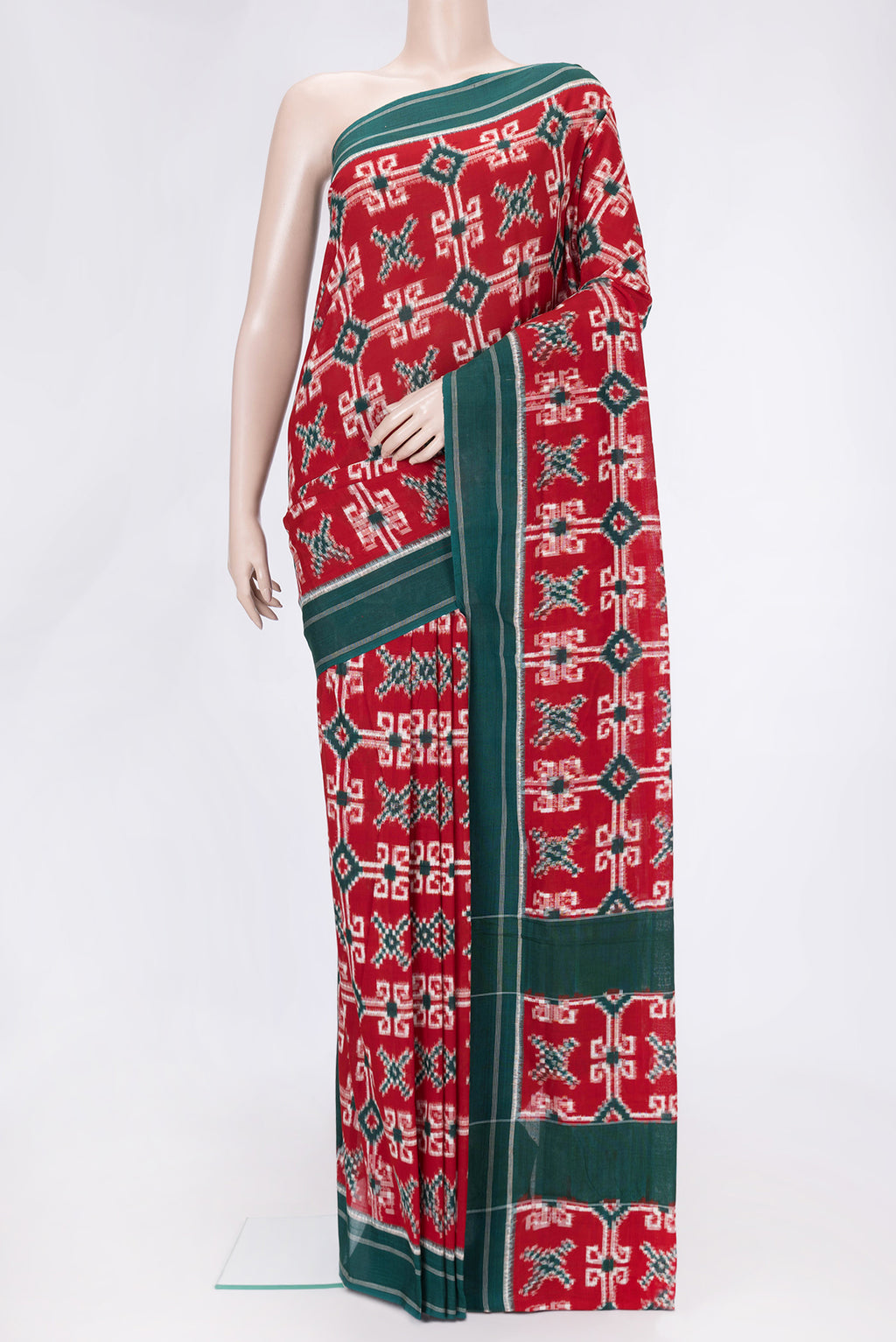 Red Dual Tone Double Ikat Saree with Ikat Print on the body and Thread Border.  displayed on a mannequin