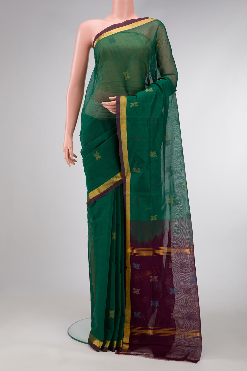 Bottle Green Dual Tone Uppada Cotton Saree with Zari Butta on the body and Zari Border.  displayed on a mannequin
