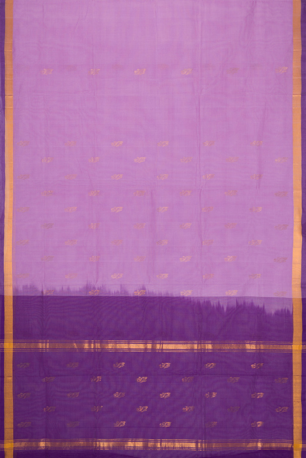 Flat view of Lavender Dual Tone Uppada Cotton Saree with Zari Butta on the body and Zari Border. 