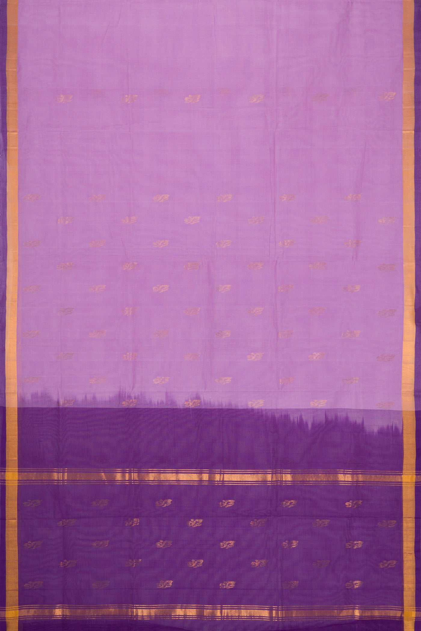 Flat view of Lavender Dual Tone Uppada Cotton Saree with Zari Butta on the body and Zari Border. 
