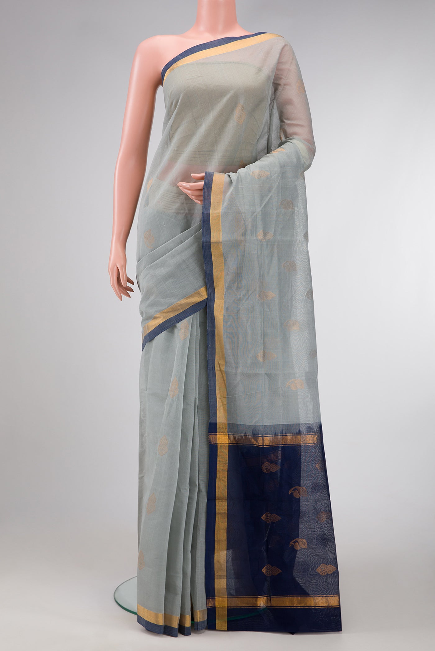 Grey Dual Tone Uppada Cotton Saree with Zari Butta on the body and Zari Border.  displayed on a mannequin