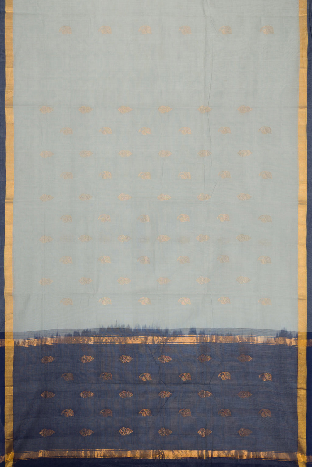 Flat view of Grey Dual Tone Uppada Cotton Saree with Zari Butta on the body and Zari Border. 