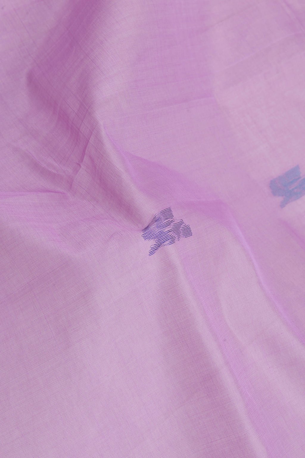 Close up of Lavender Uppada Cotton Saree with Zari And Thread Butta on the body and Zari Border.  displaying folds