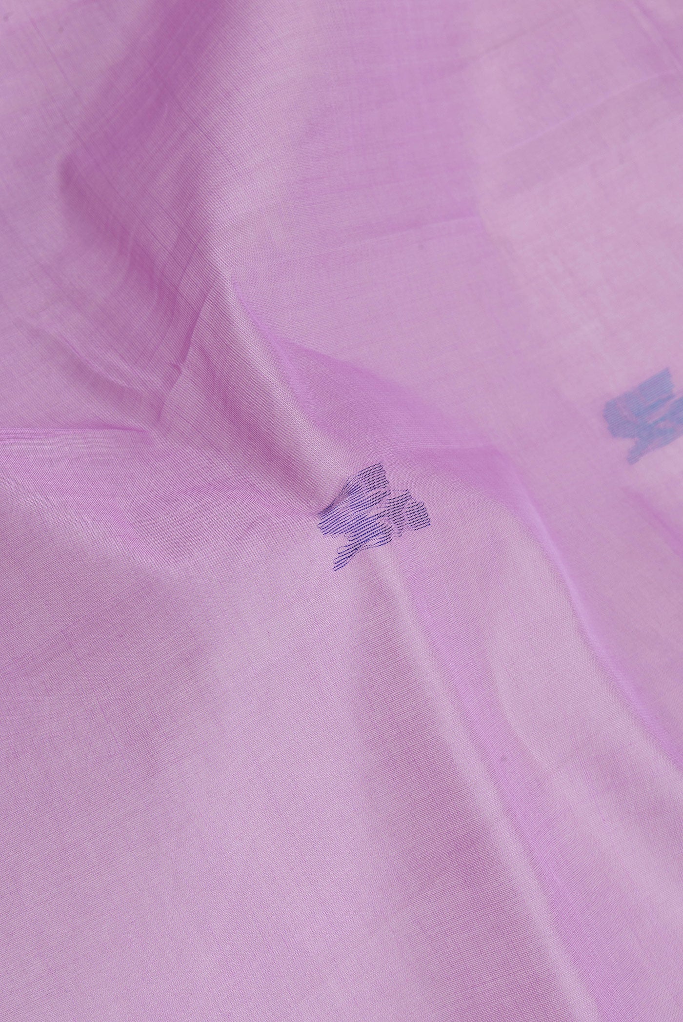Close up of Lavender Uppada Cotton Saree with Zari And Thread Butta on the body and Zari Border.  displaying folds