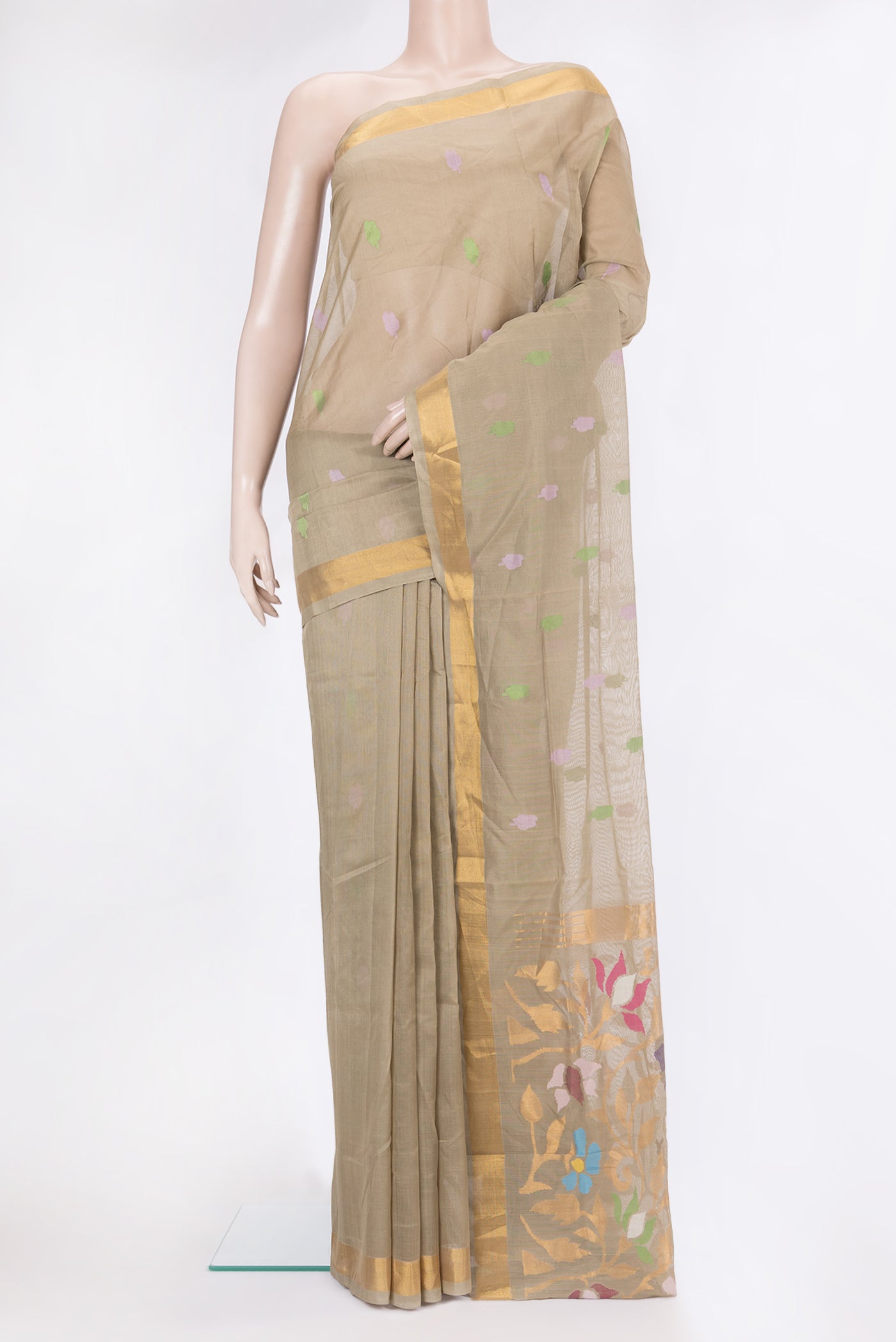 Dark Beige Uppada Cotton Saree with Zari And Thread Butta on the body and Zari Border.  displayed on a mannequin